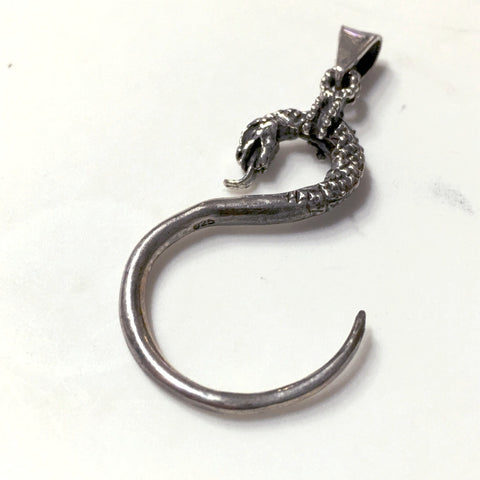 swirling snake pendant